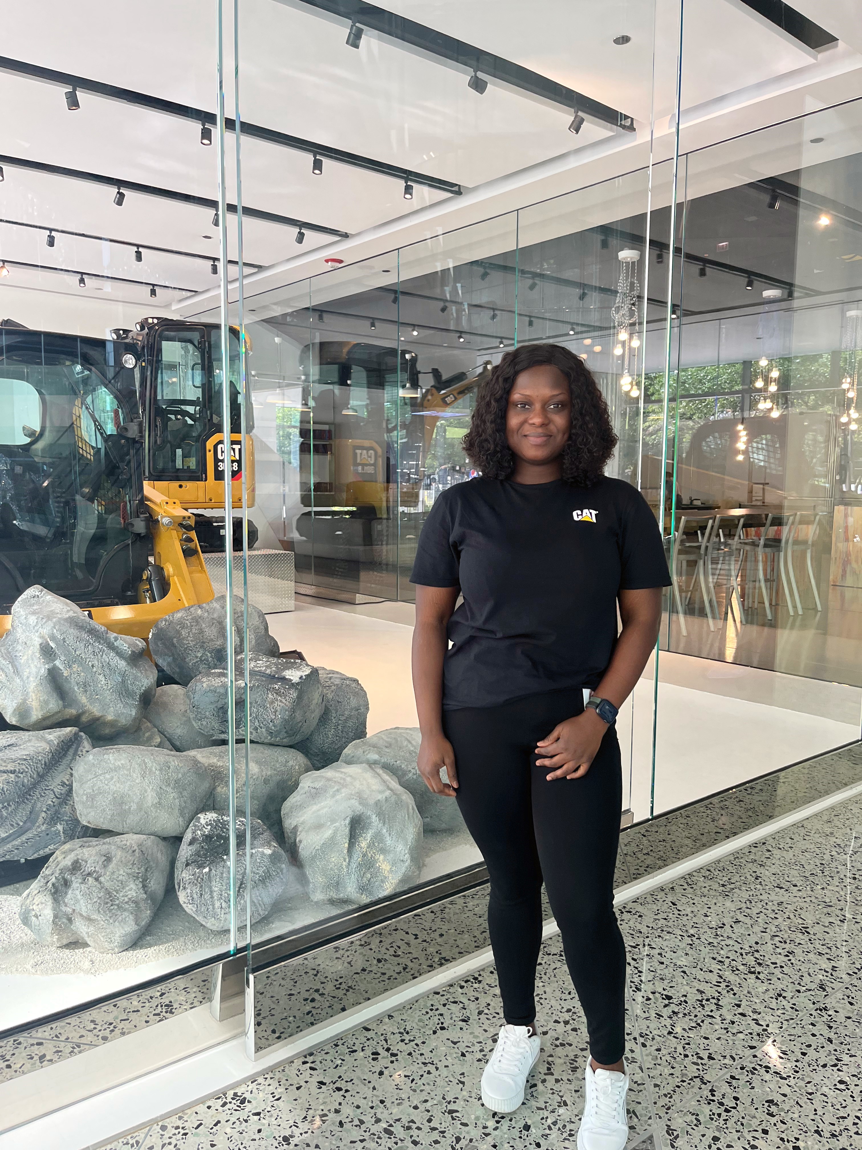 a person standing in front of a glass wall