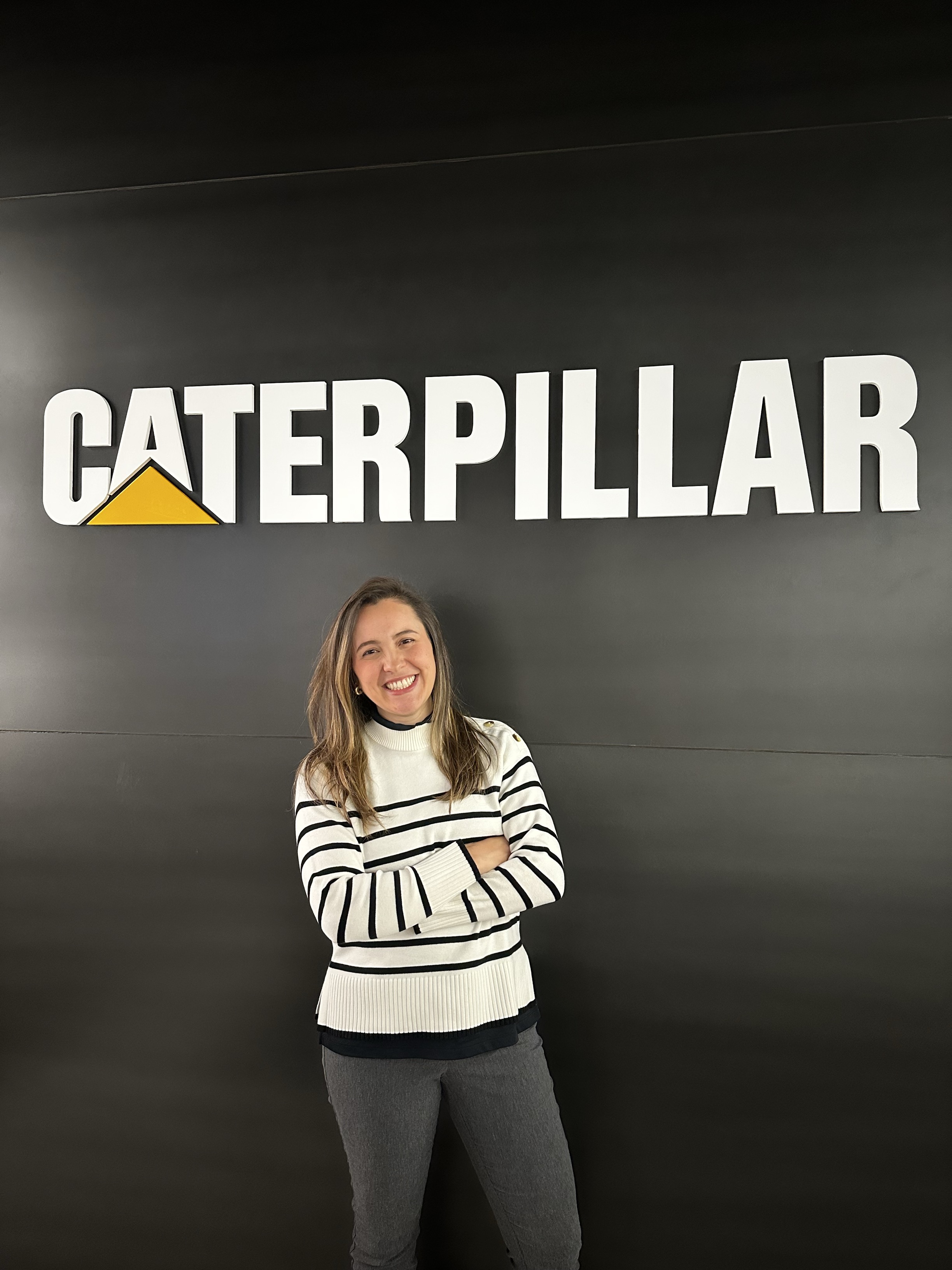 a person standing in front of a sign