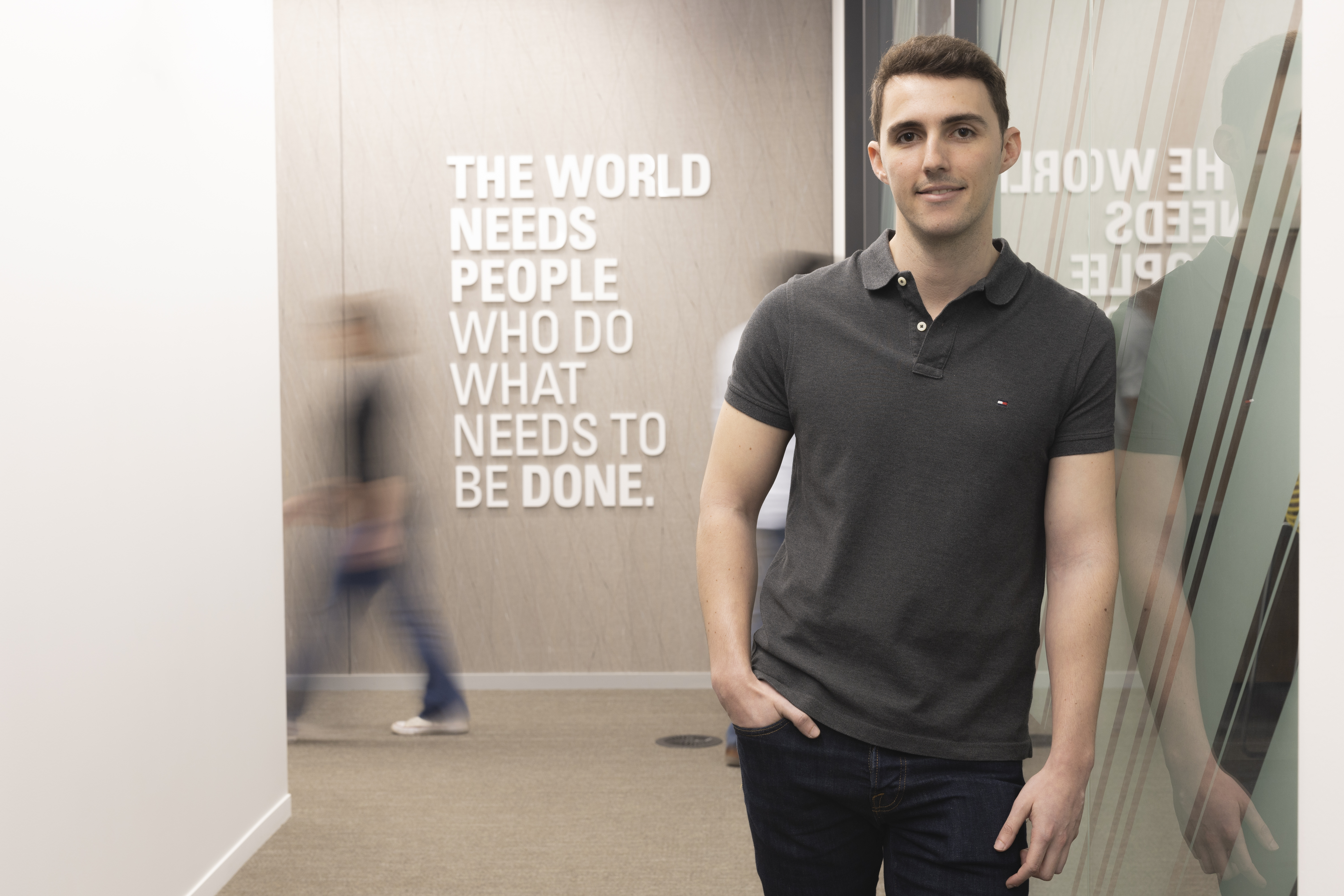 a person standing in a hallway