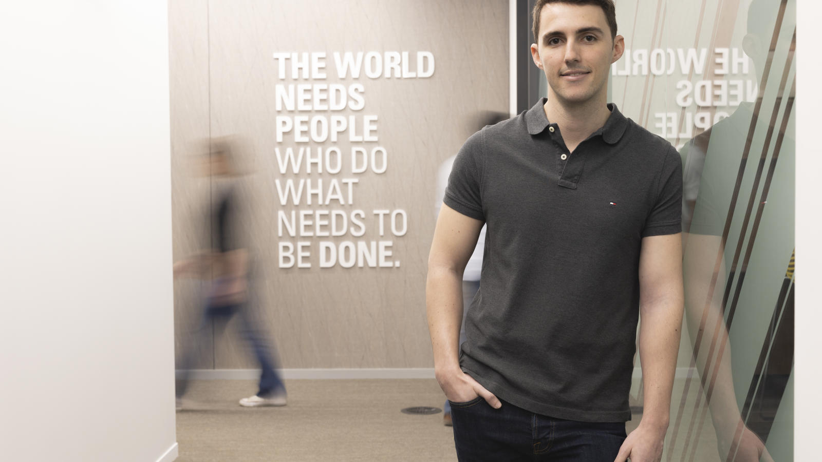 a person standing in a hallway