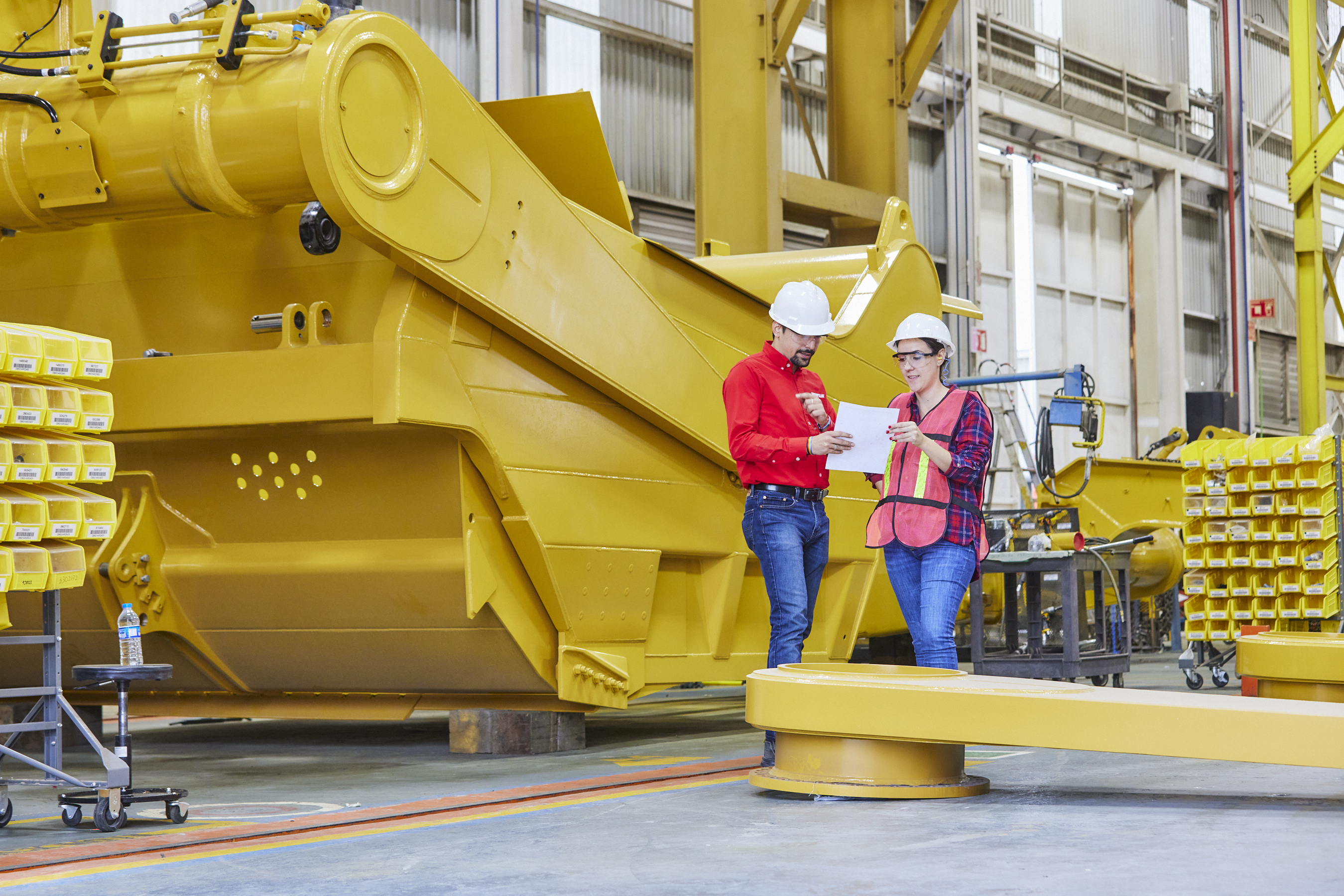 a person and person in a factory