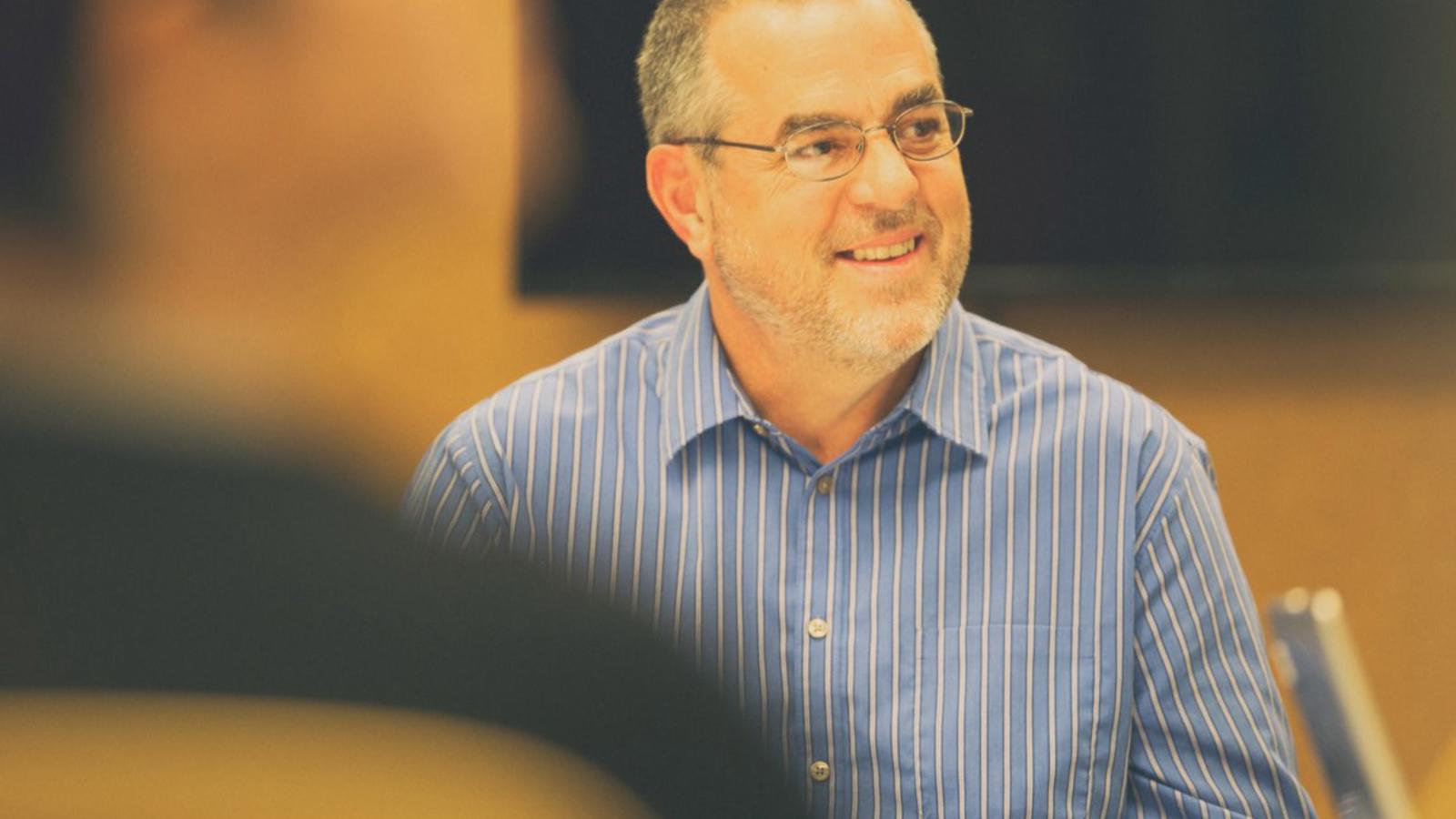 a person in a blue striped shirt