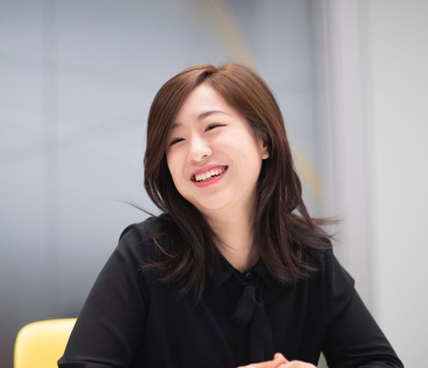 a person smiling at the camera
