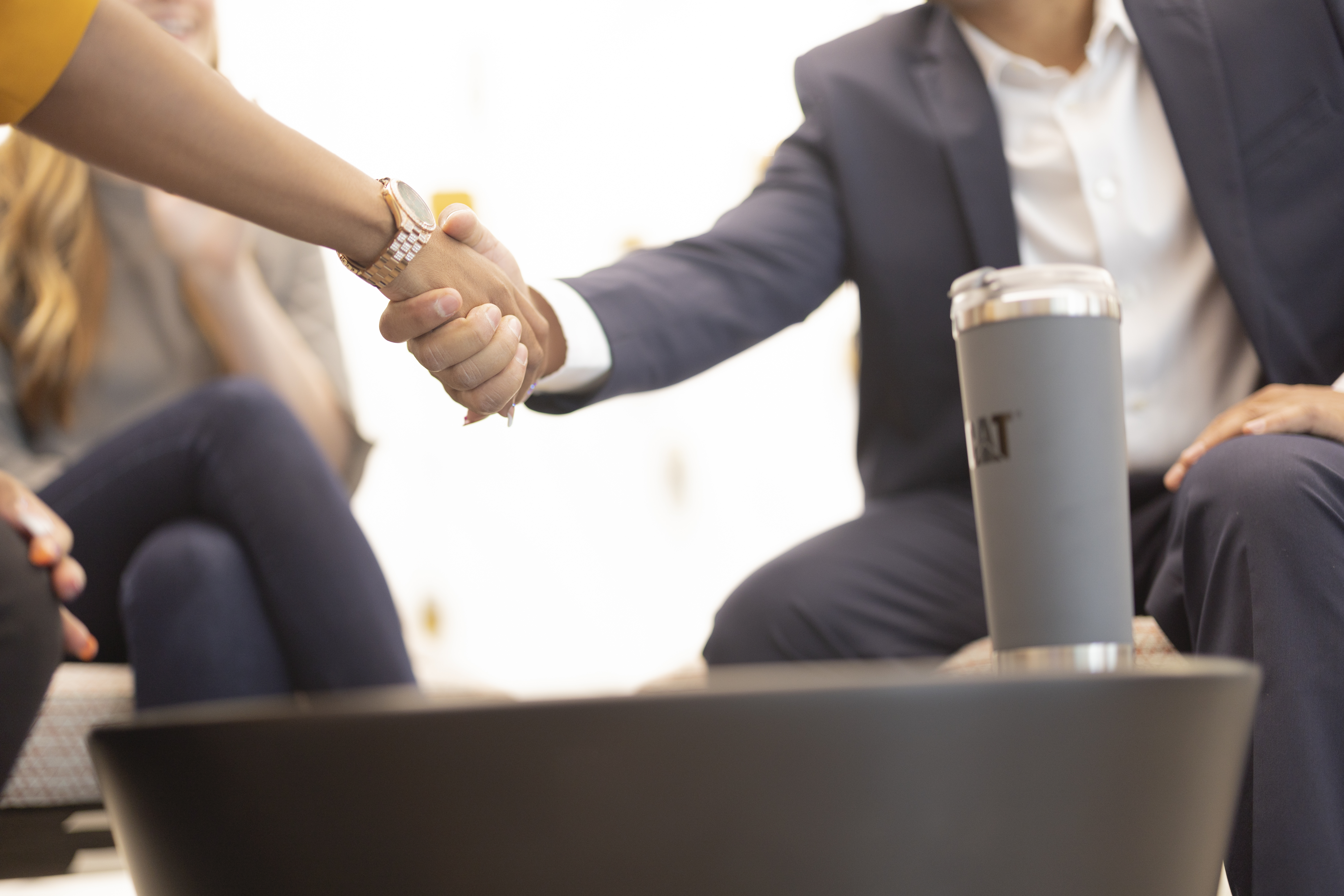 a person and person shaking hands